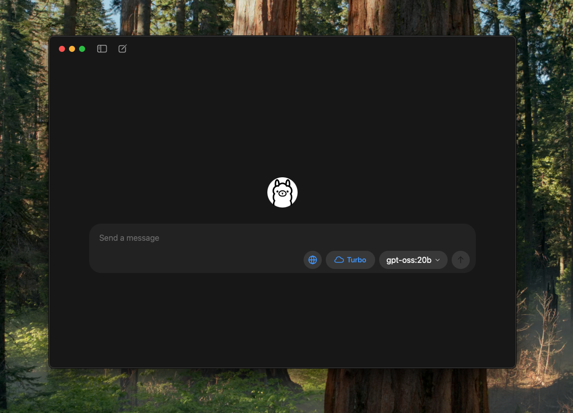 Ollama desktop app showing a dark window with the llama logo centred and a message input field at the bottom